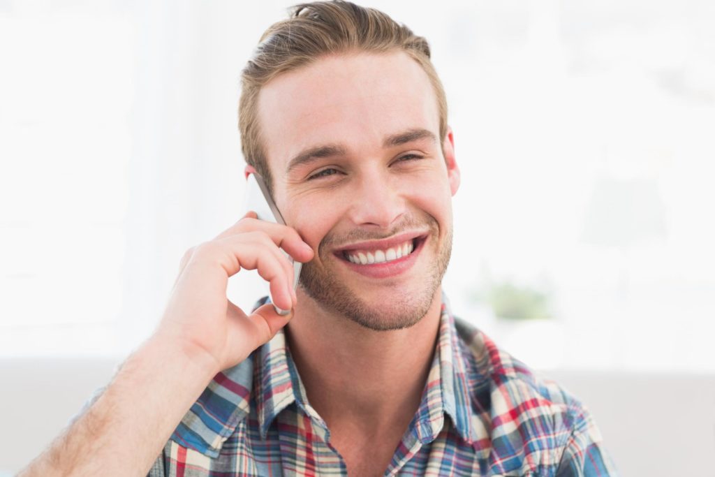 customer service smiling taking phone call